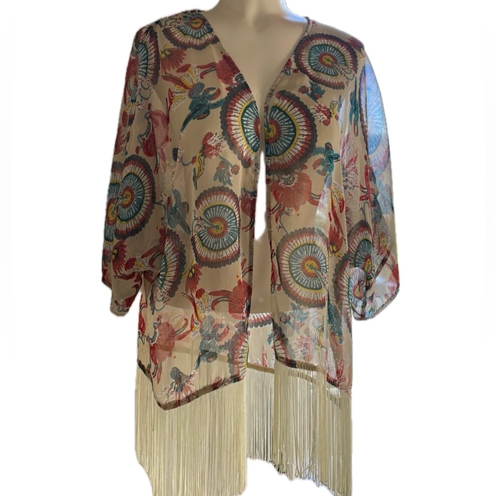 Boho colourful cover up with looped fringes and short  sleeves .
